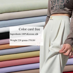 In-stock polyester woven fabric, featuring a draping texture and slight elasticity, suitable for pants